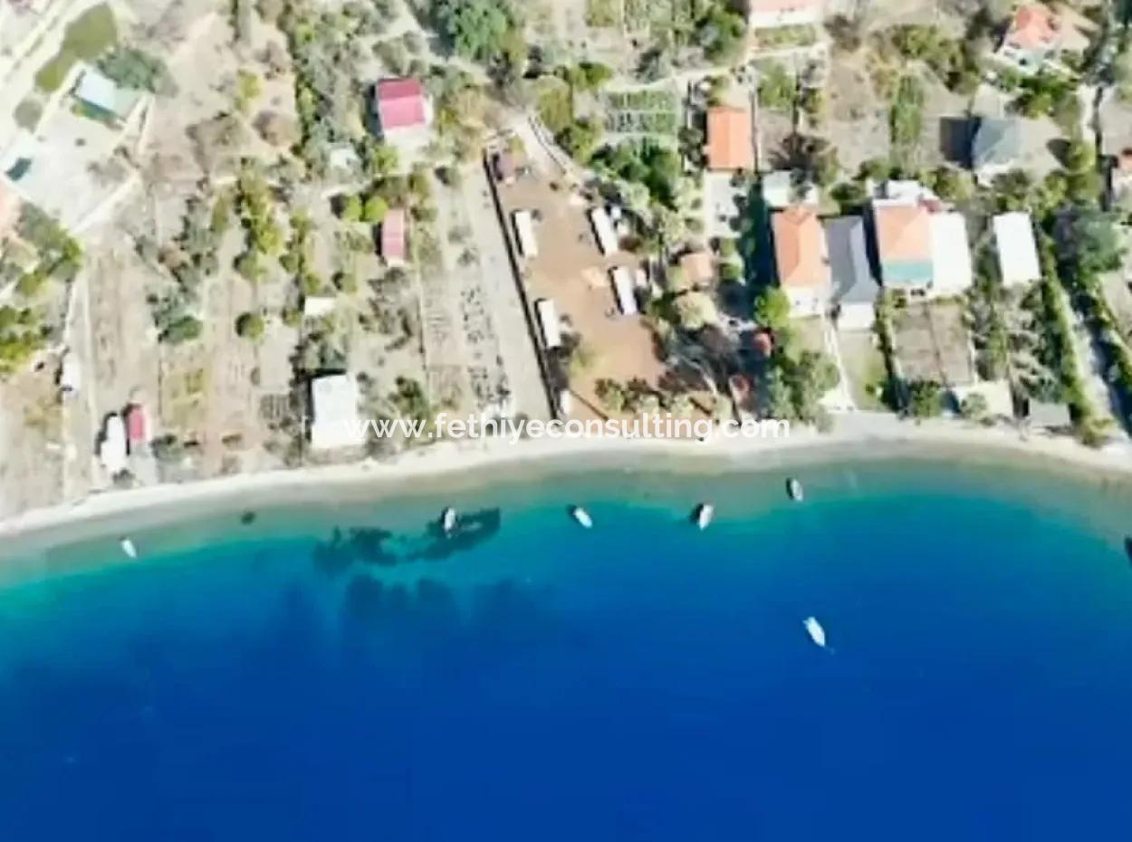 Einfamilienhaus Zum Verkauf Auf Einem 2000M2 Großen Grundstück Am Meer Im Viertel Marmaris Söğüt. Geeignet Zum Festbinden Eines Bootes Davor.